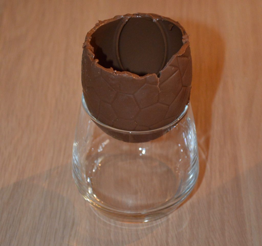 How to make Cheesecake Chocolate Eggs - slice off the top of the chocolate egg