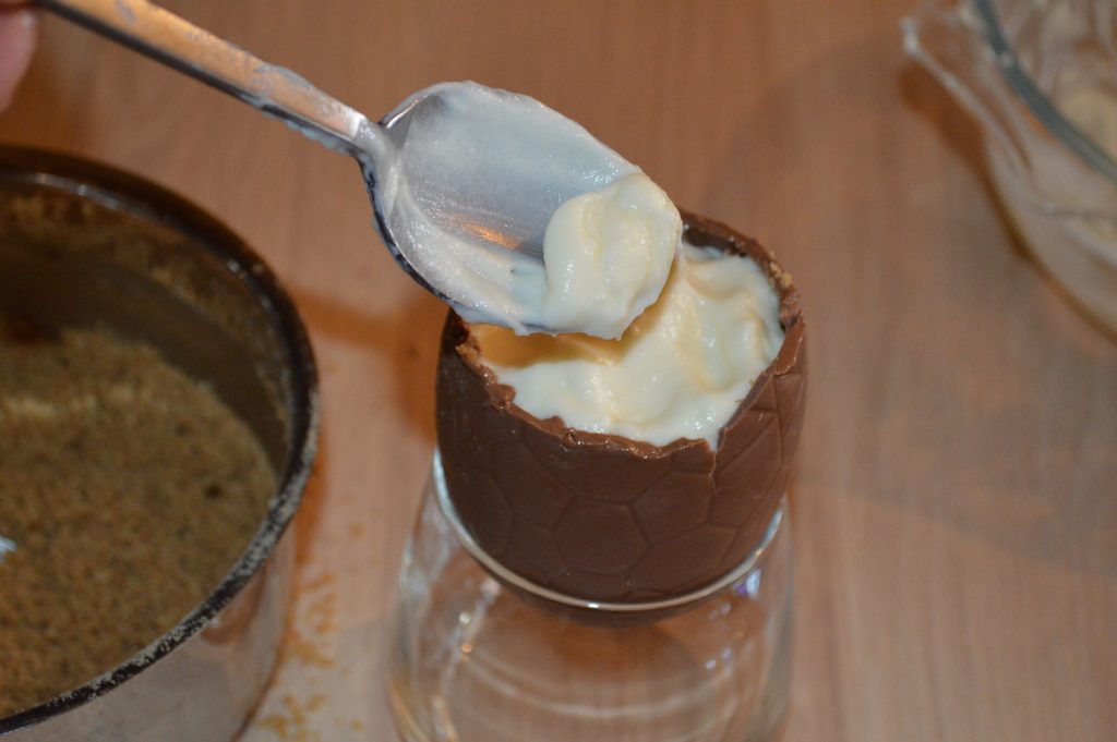 How to make Cheesecake Chocolate Eggs - add cheesecake mix to the egg
